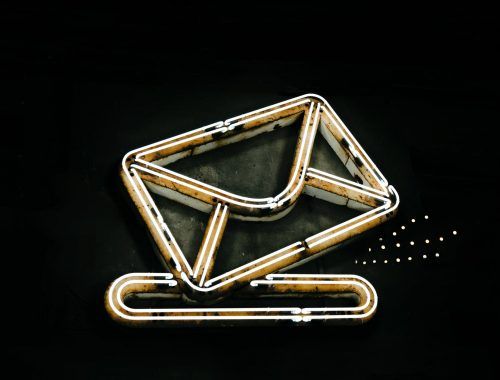 gold letter y on black background