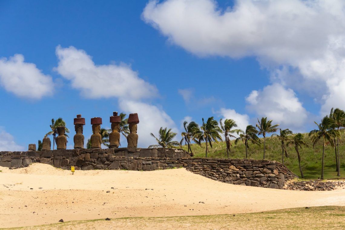 stone sculptures on a sandy island