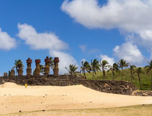 stone sculptures on a sandy island