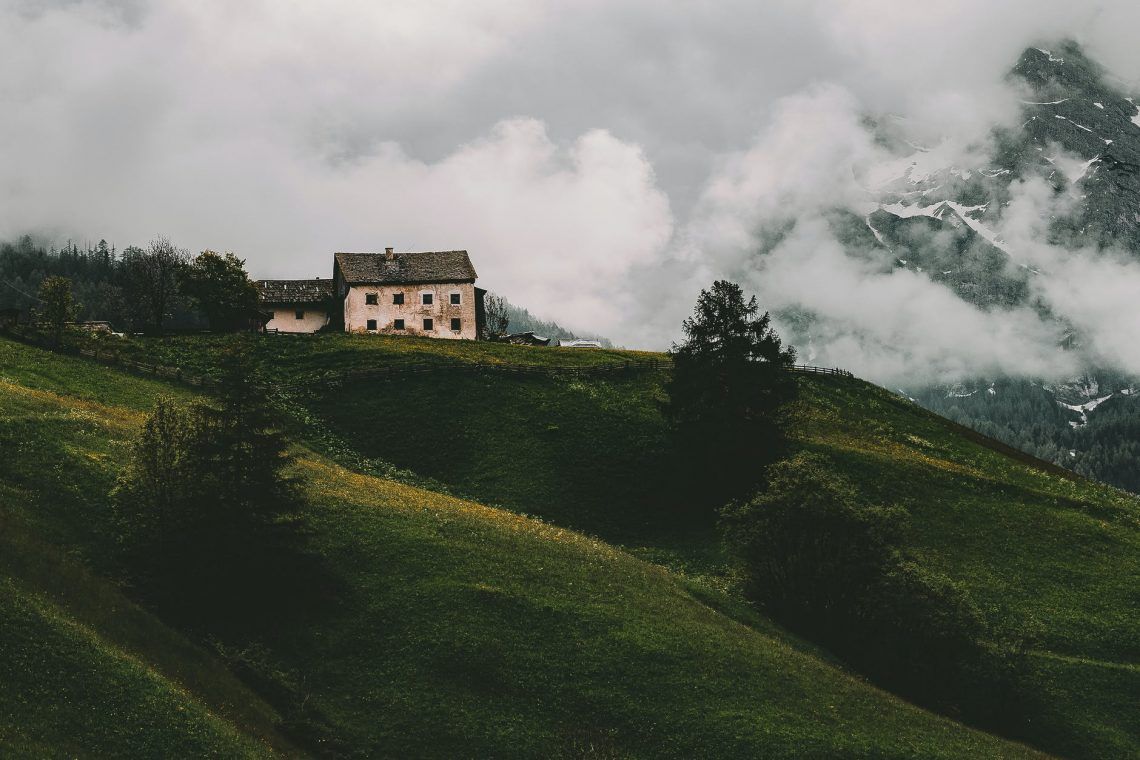 white and gray house on mountain