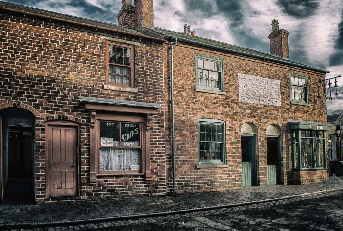 architectural photography of brown brick building