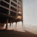 abandoned concrete building under white sky