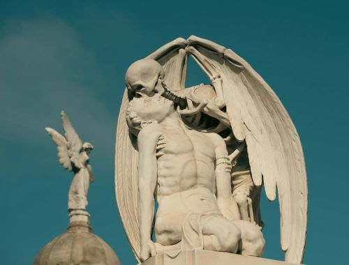 the kiss of death sculpture in poblenou cemetery in barcelona spain